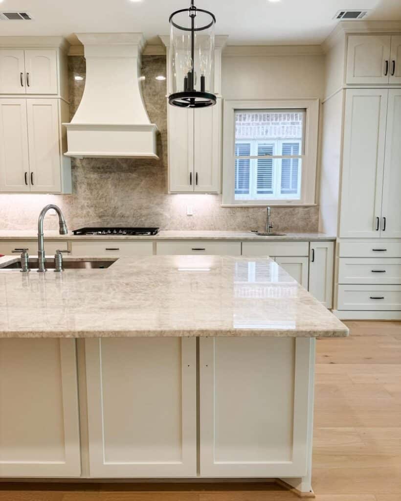 Antique White Cabinetry and Quartzite Counters