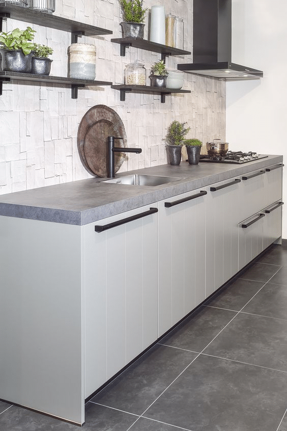 Concrete Countertops and Gray Textured Cabinets
