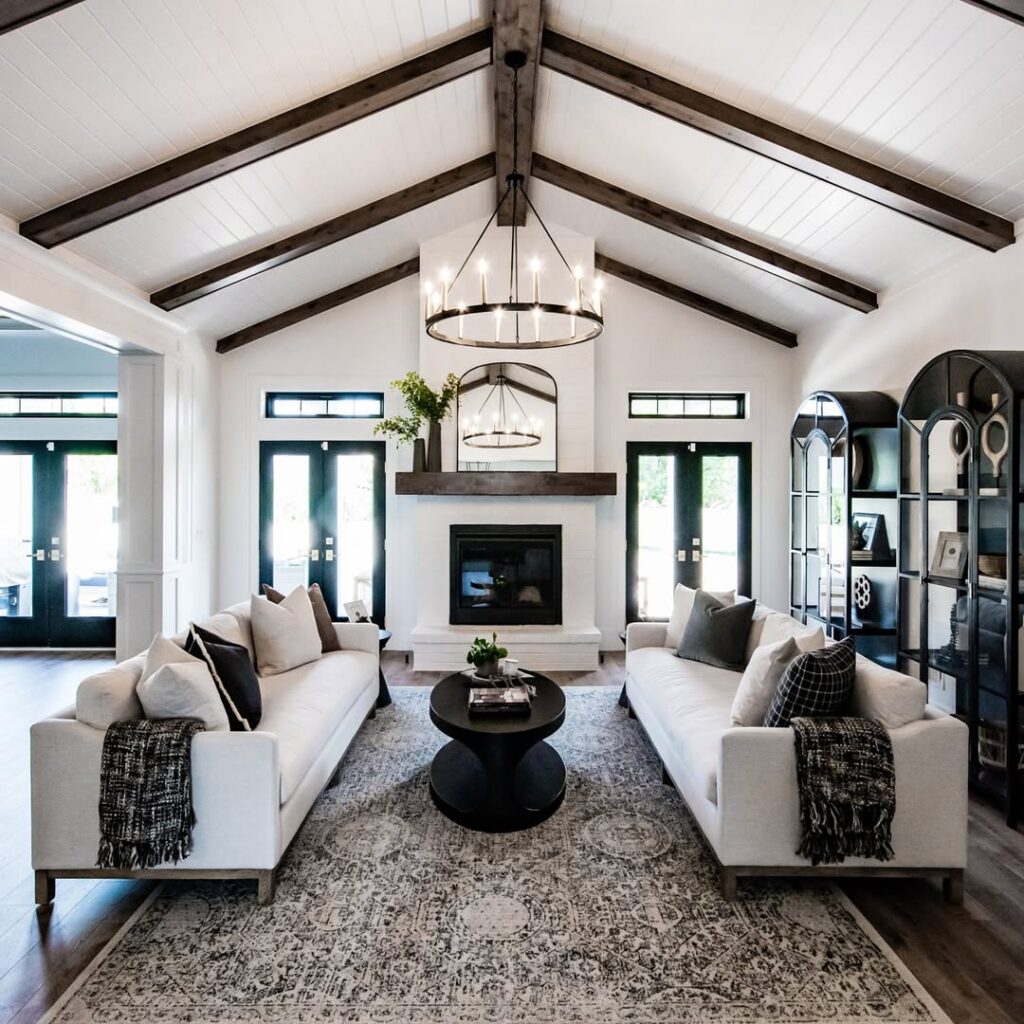 Farmhouse Living Room With Vaulted Ceiling and Exposed Beams