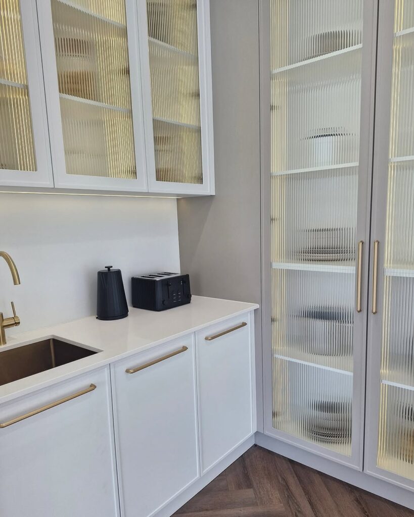 Fluted Glass Inserts for Antique White Kitchen Cabinets