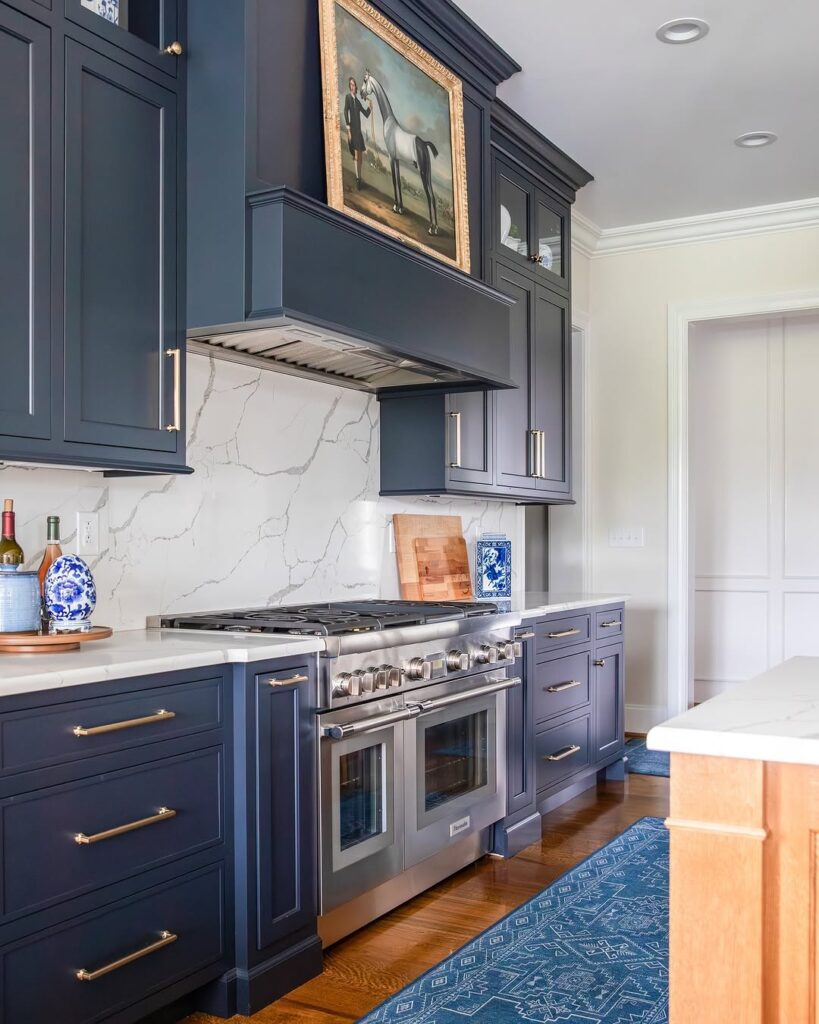 Brass Details on Navy Cabinets