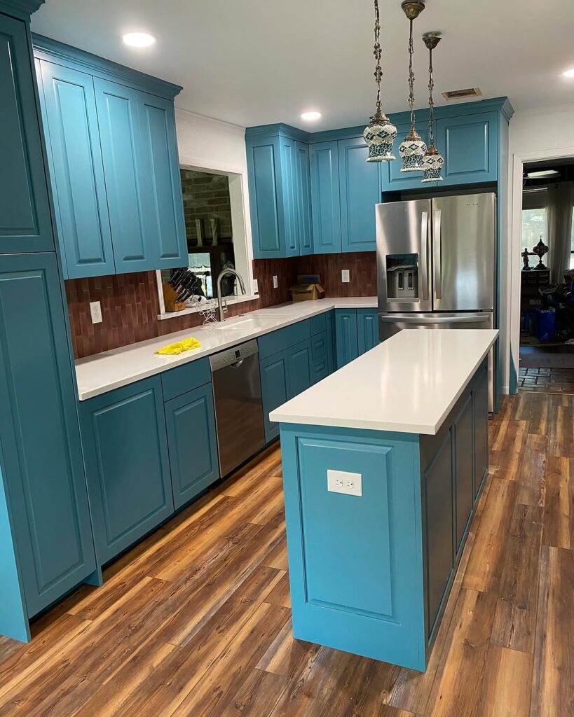 White Countertops for Teal Cabinets
