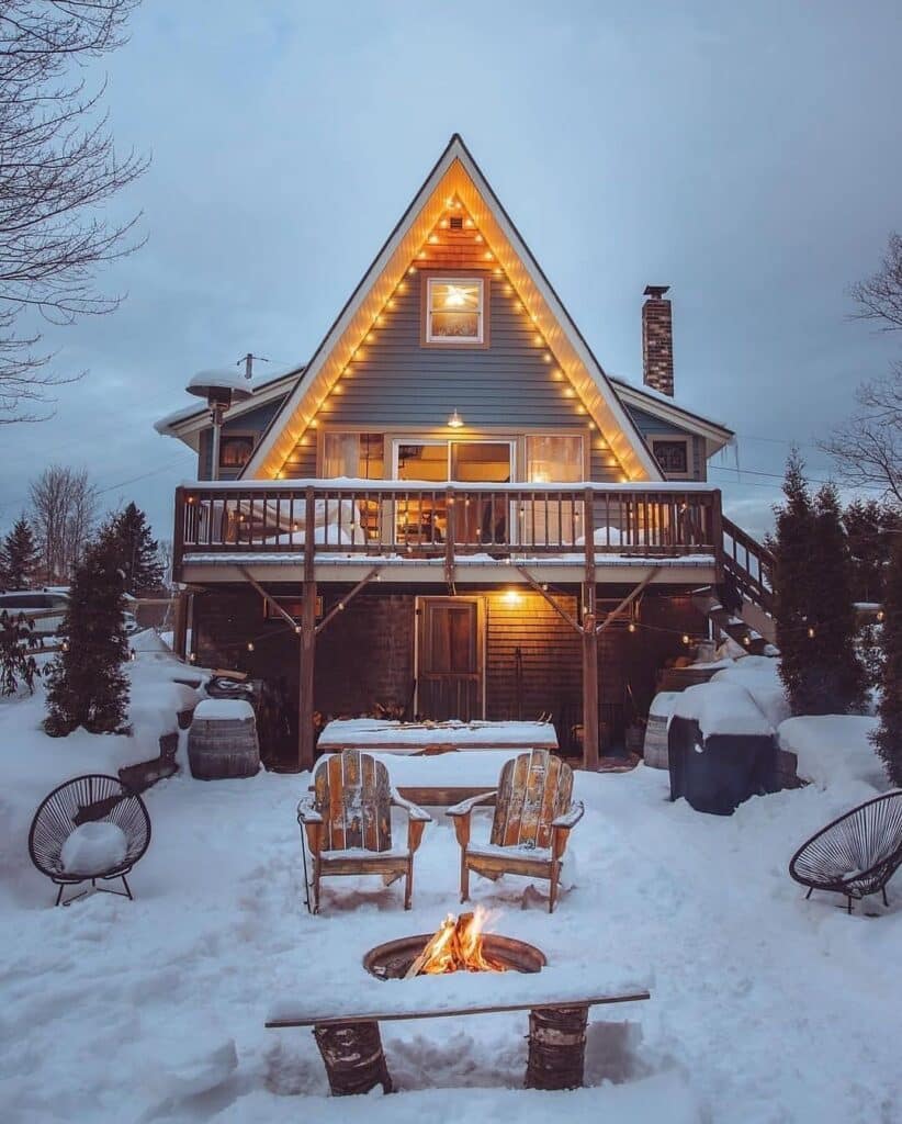 Winter A-Frame Cabin by a Firepit