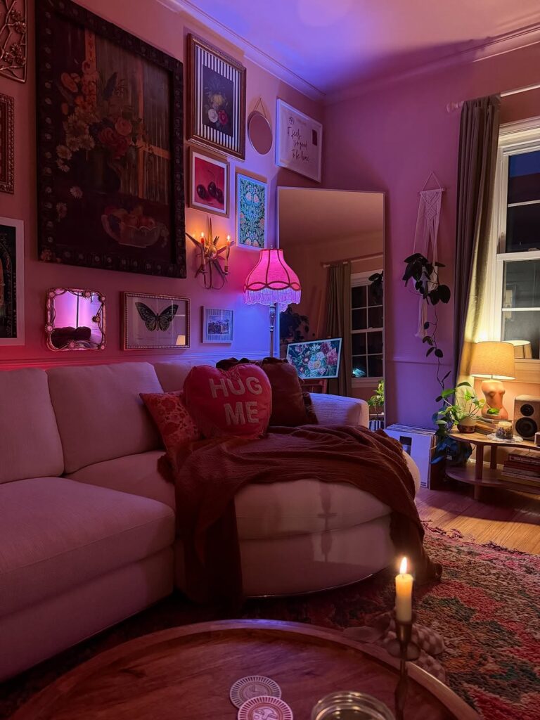 Dark-Walled Living Room with Low Lighting and Eclectic Textures