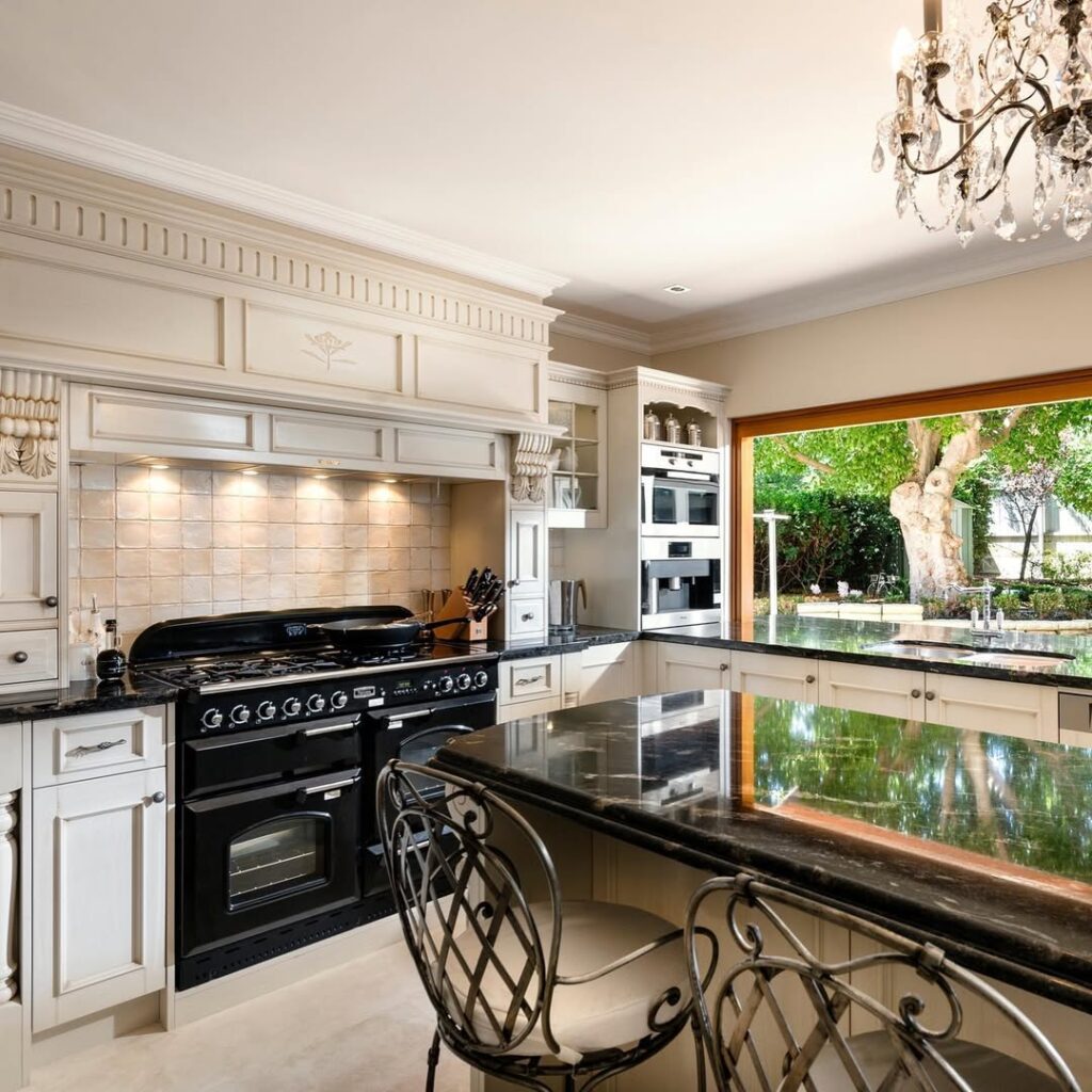 Classic Cream Cabinets and Black Range