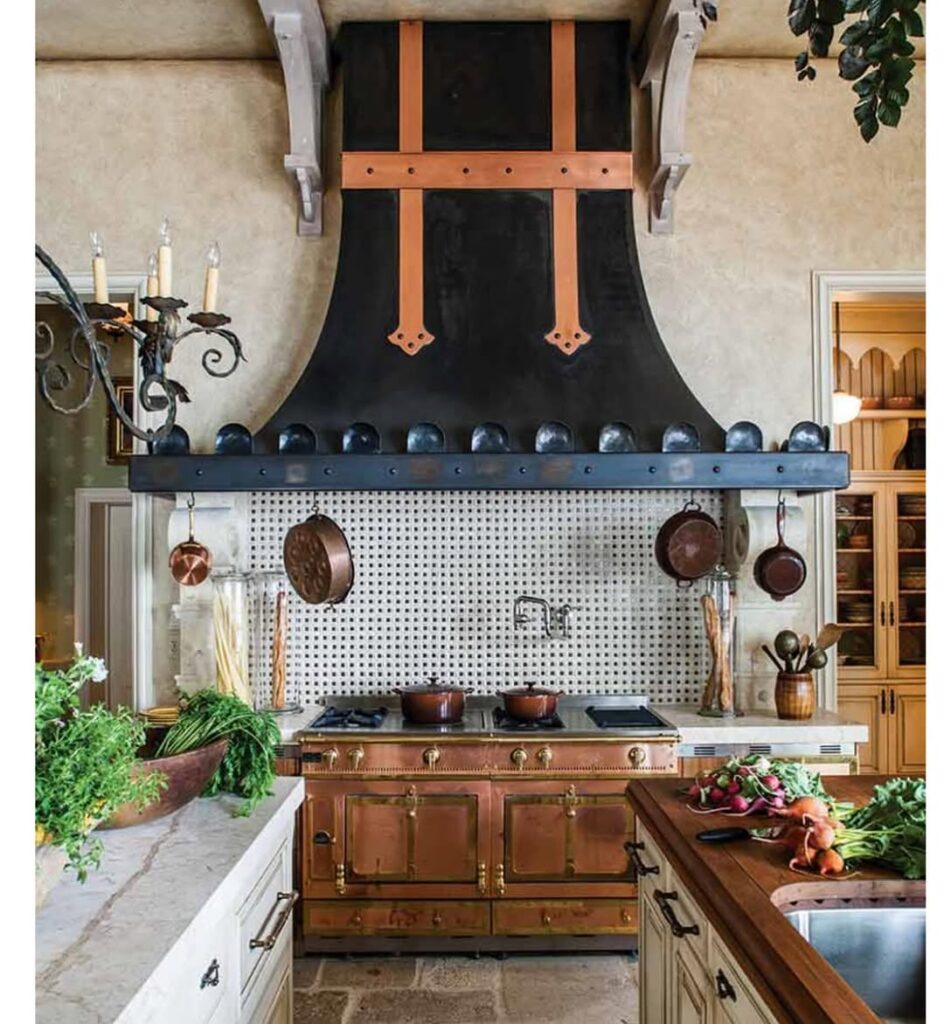 Polished Copper and Iron Farmhouse Kitchen