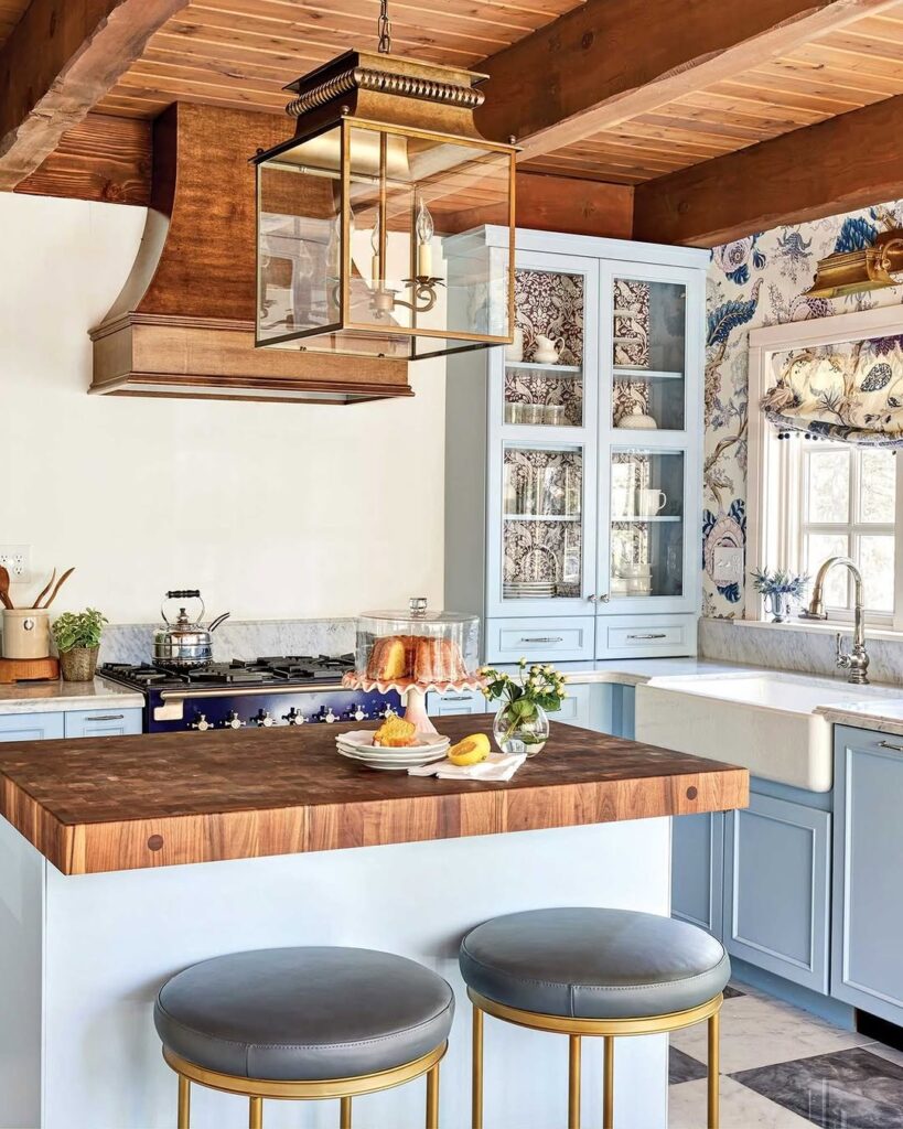 Powder Blue Cabinetry and Natural Wood Hood