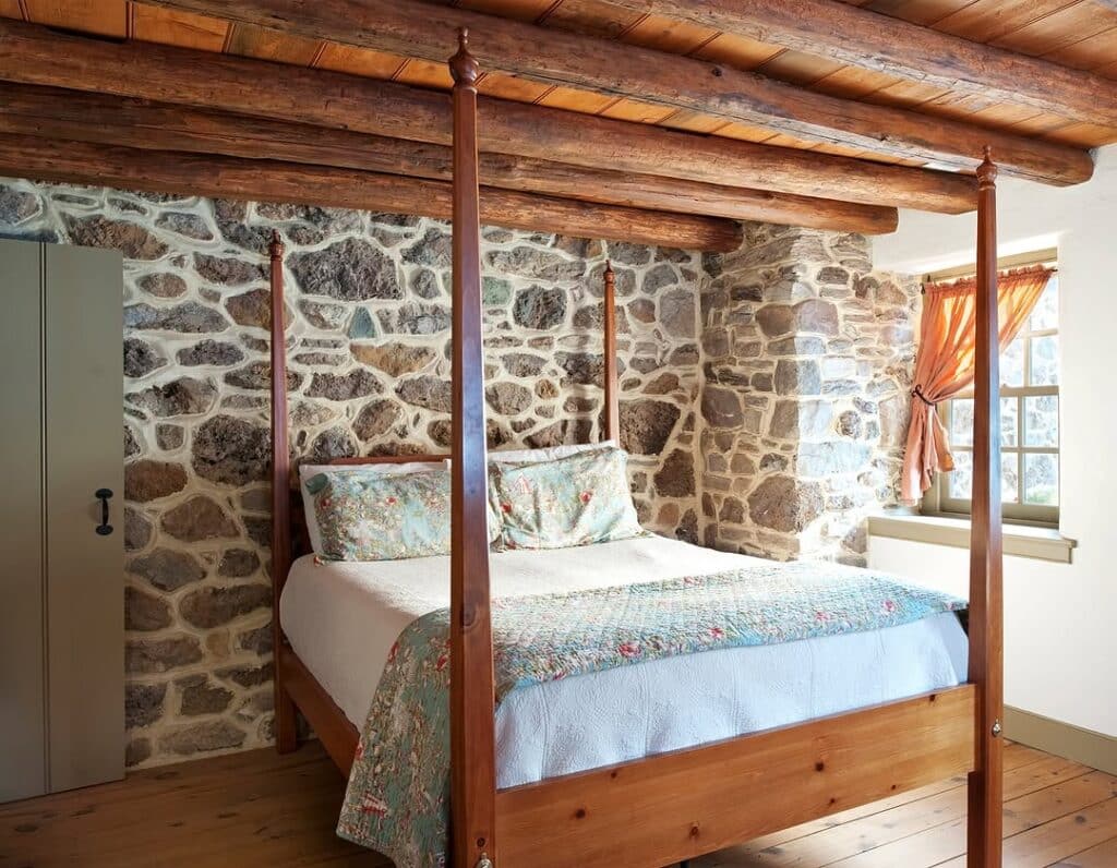 Rustic Bedroom with Stone and Timber