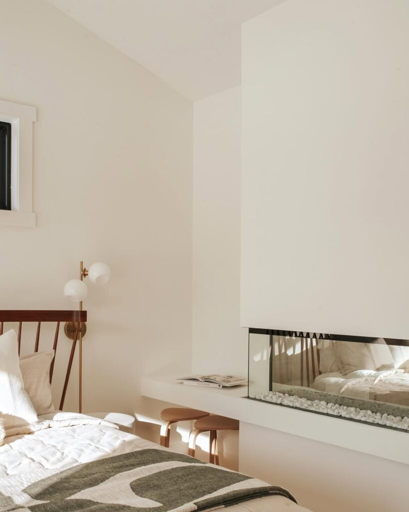 White Fireplace Nook in a Minimal Bedroom