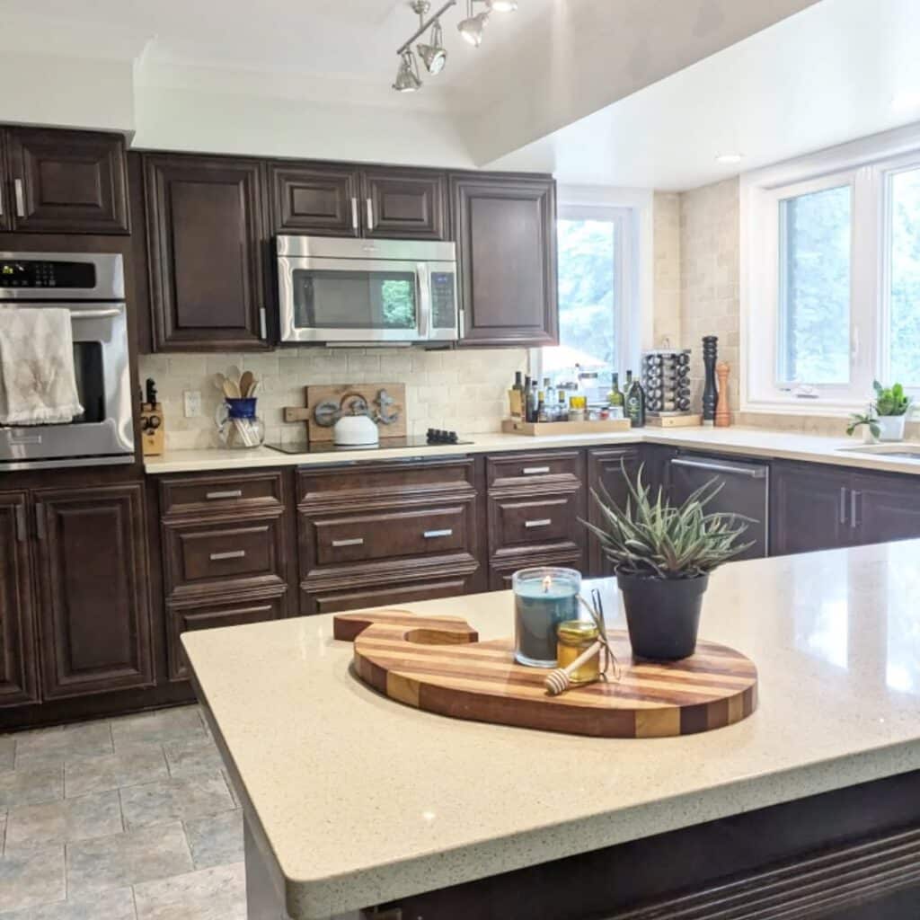 Dark Chocolate Cabinetry and Contemporary Hardware in a Blended Style