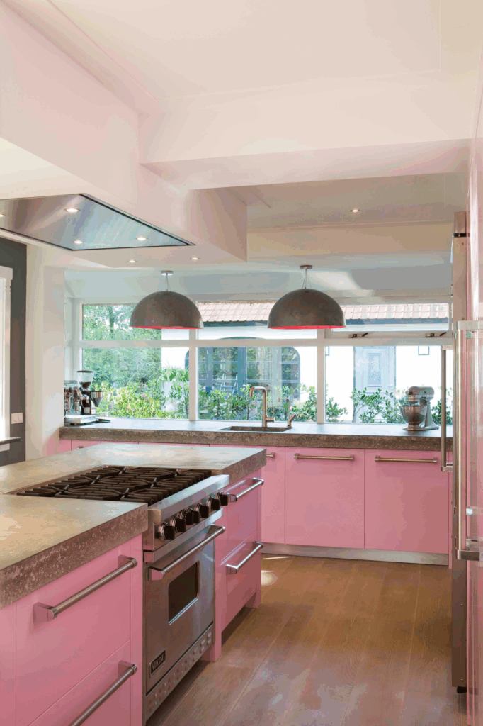 Pink Cabinetry and Concrete Countertops