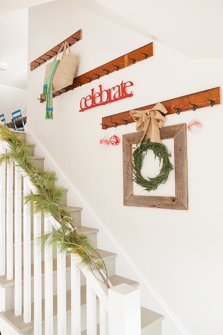 Antique empty frames are a perfect way to decorate the staircase wall [From: Julie Ranee Photography]