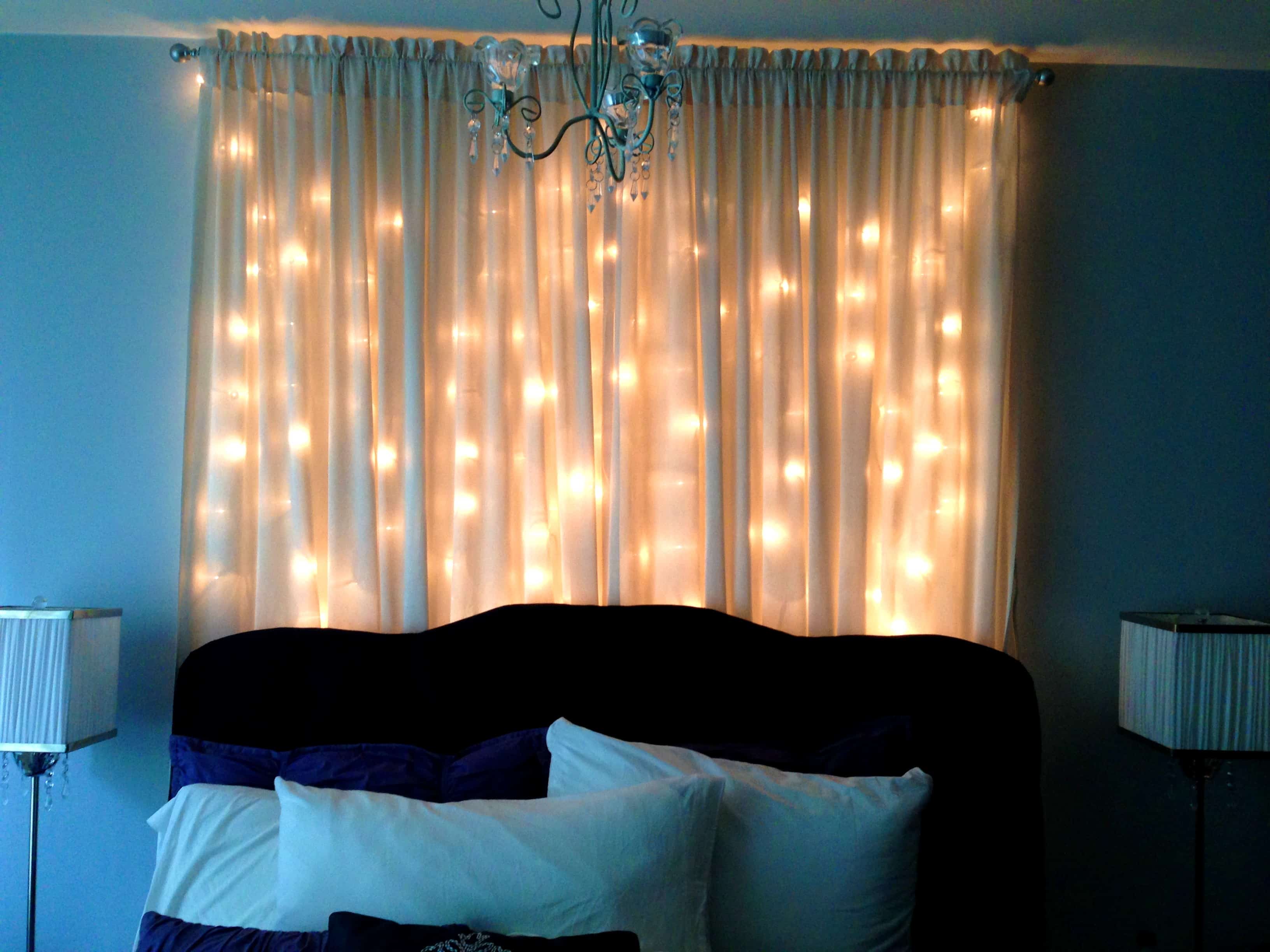 curtain-lights An easy way to create that charming effect while using a curtain full of lights is placing the lights directly on the window and placing the curtains on top