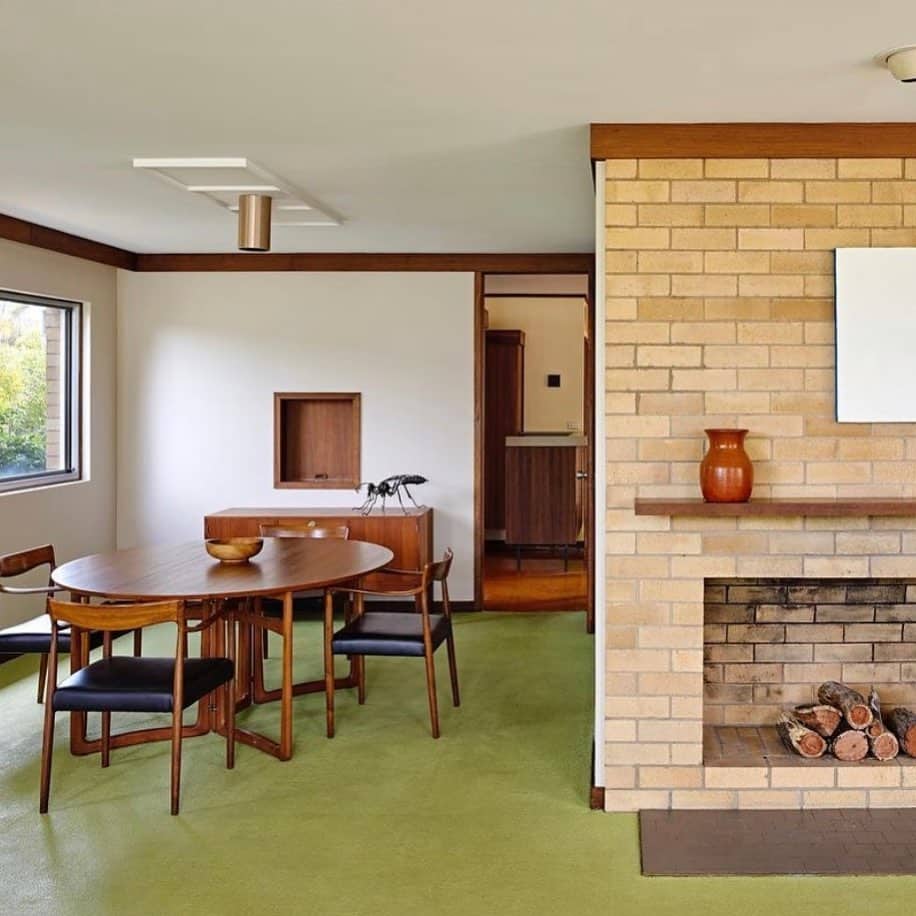 Green Carpet by a Mid-Century Brick Fireplace