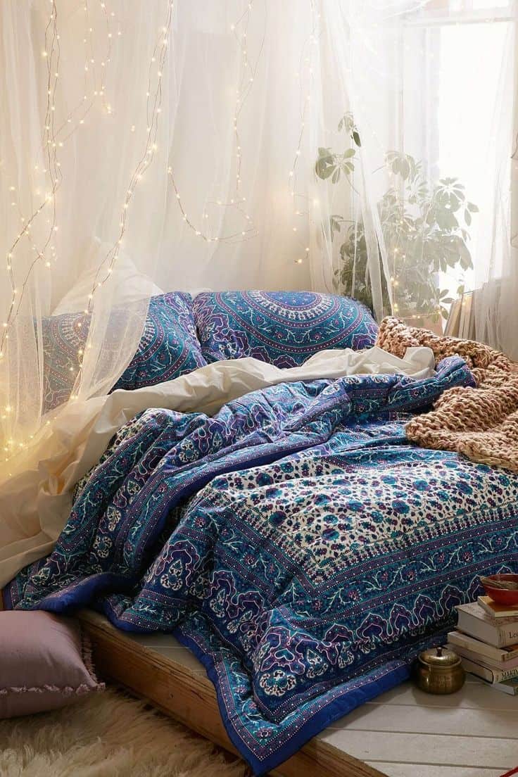 Drape lights around your bed for a romantic feel that is also bohemian and fun.