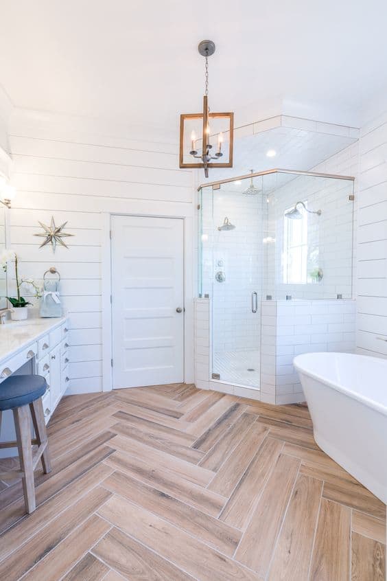 light herringbone wood tile bathroom