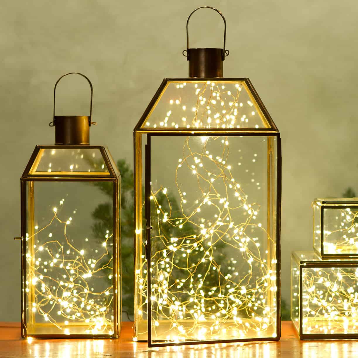 Incorporating Christmas fairy lights inside of any lantern case can give you a bolder lighting fixture than a simple lantern would.