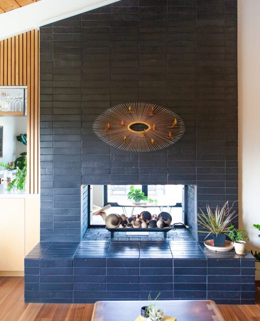 Mid-Century Black Two-Sided Brick Fireplace