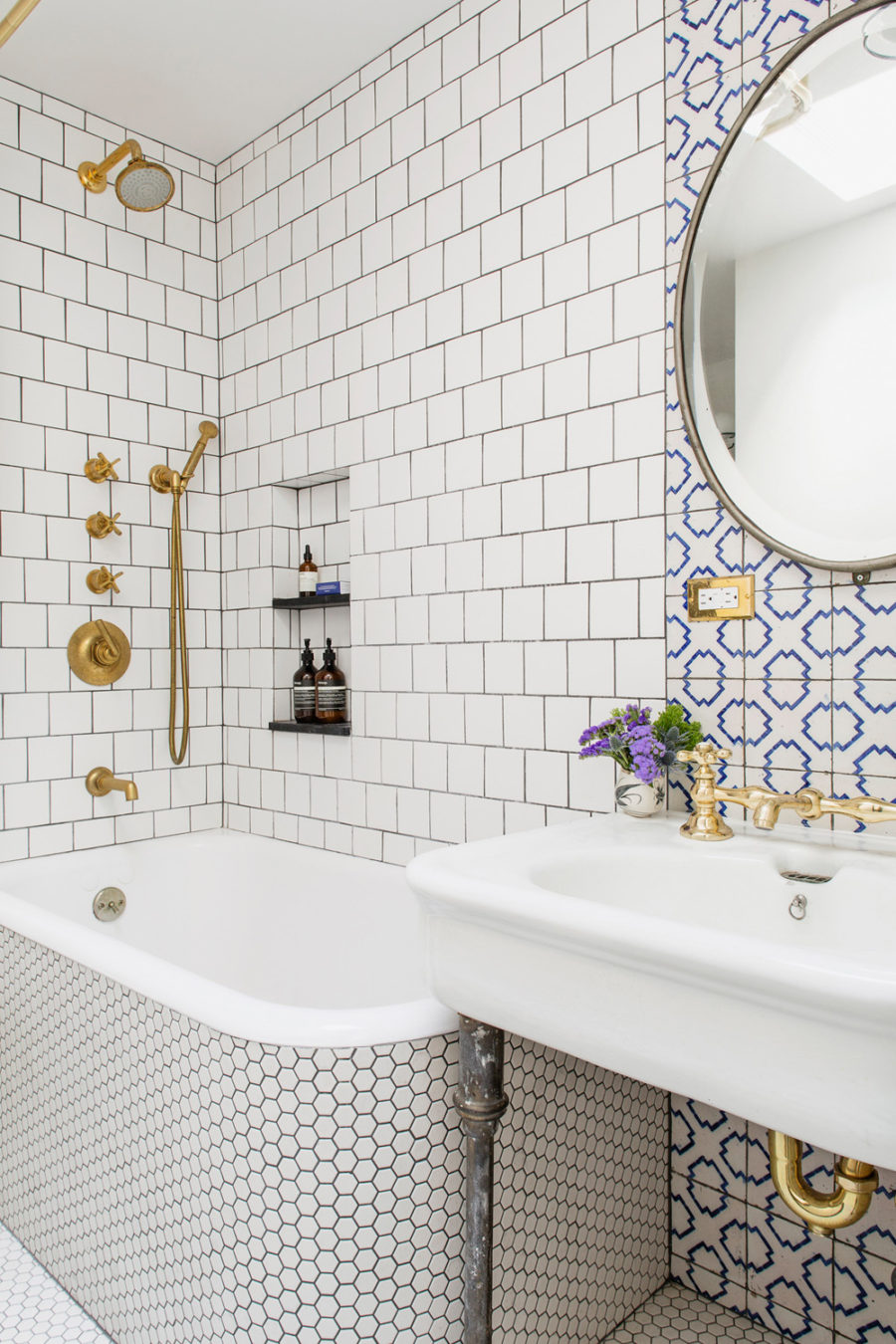 Mixed tile bath by Ensemble Architecture