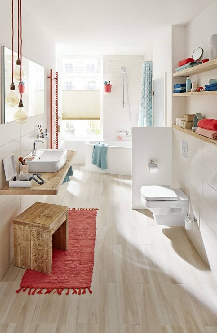 modern light wood tile bathroom with pops of color