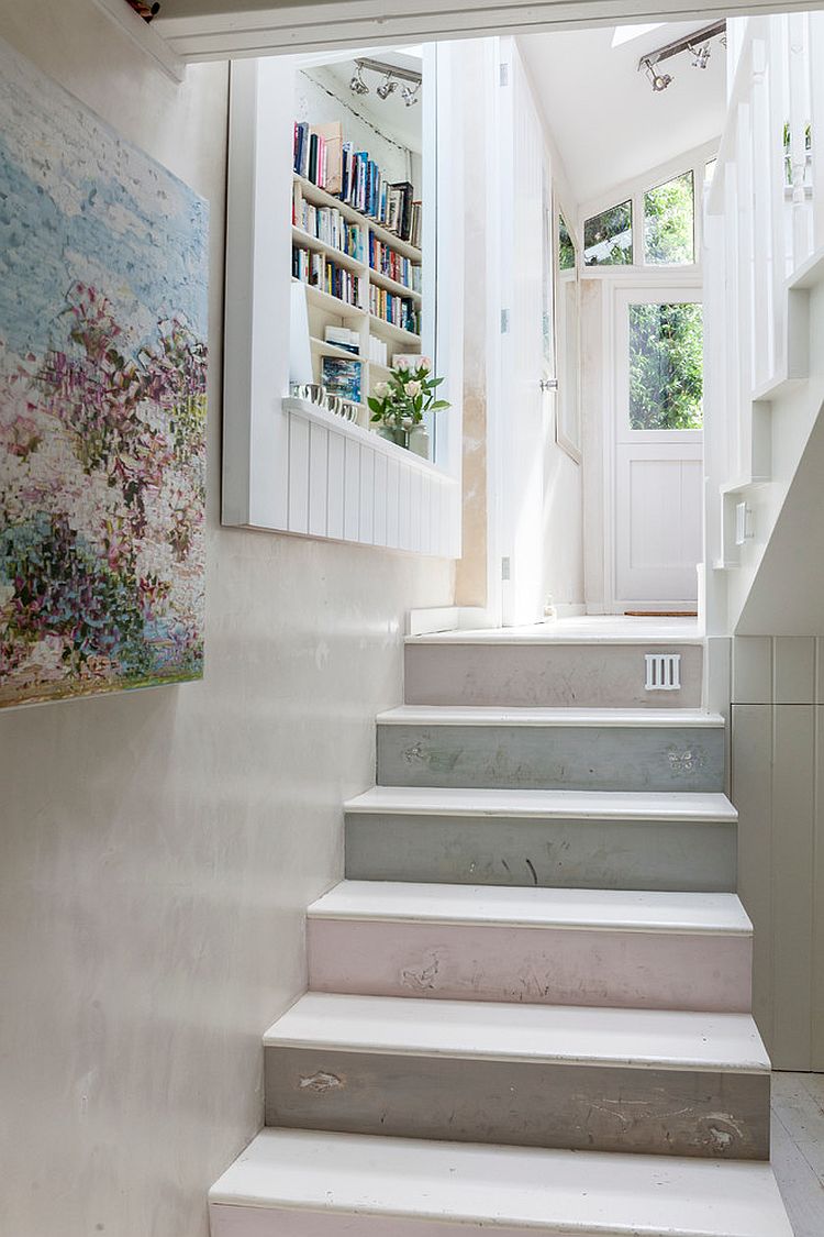 Plaster finish and shelf for the staircase wall create a cozy and fun ambiance [From: Chris Snook Photography]