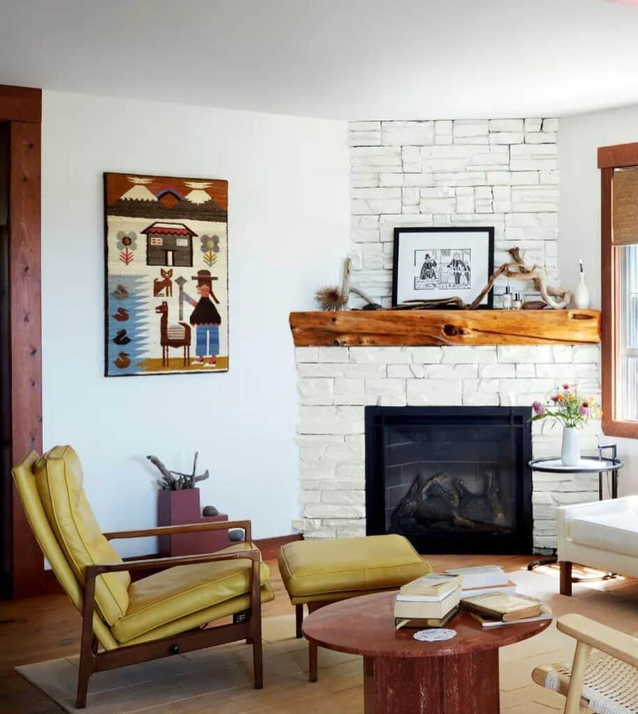 Rustic Wood Mantel on a White Stone Surround