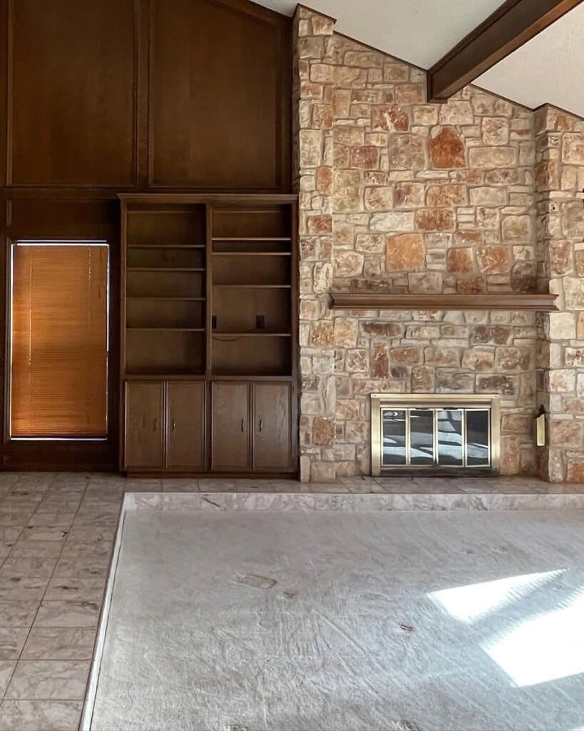 Stone Fireplace With Built-In Shelving