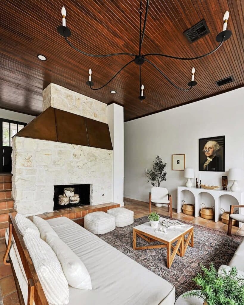 Stone Fireplace With Warm Wood Ceiling