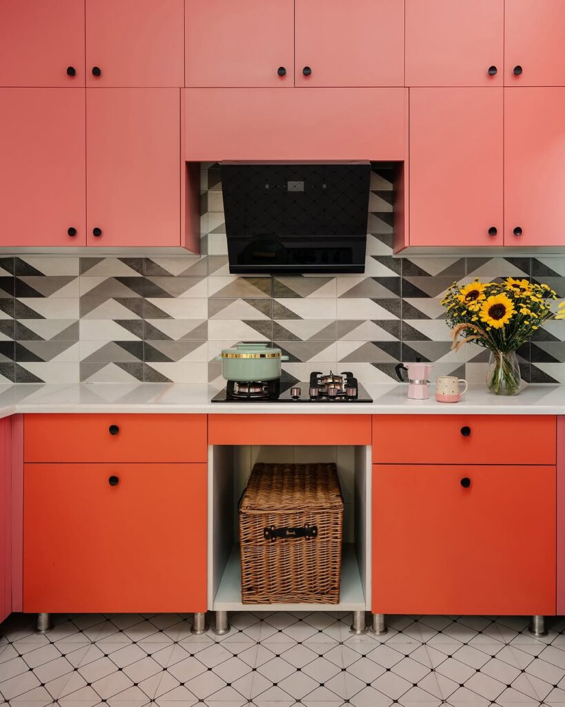 Terracotta Cabinetry with a Geometric Backsplash