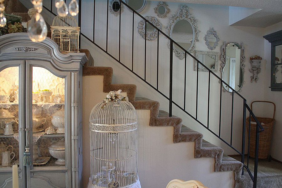 Thrift store and flea market finds with common hue create a beautiful staircase wall [From: My Romantic Home]