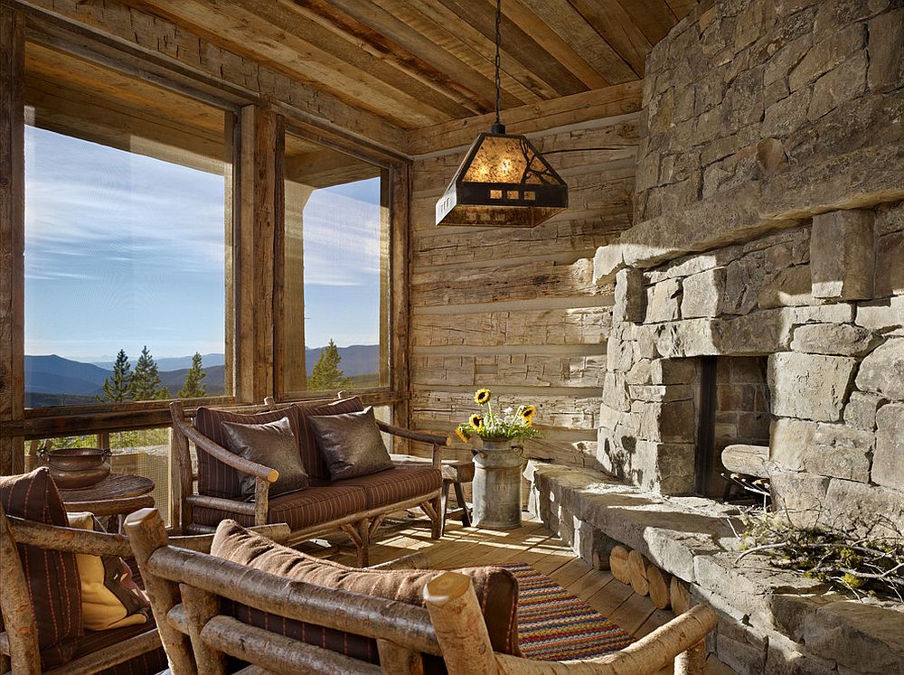 View outside the window and stone walls shape an idyllic rustic sunroom [From: Yellowstone Traditions / Benjamin Benschneider Photography]