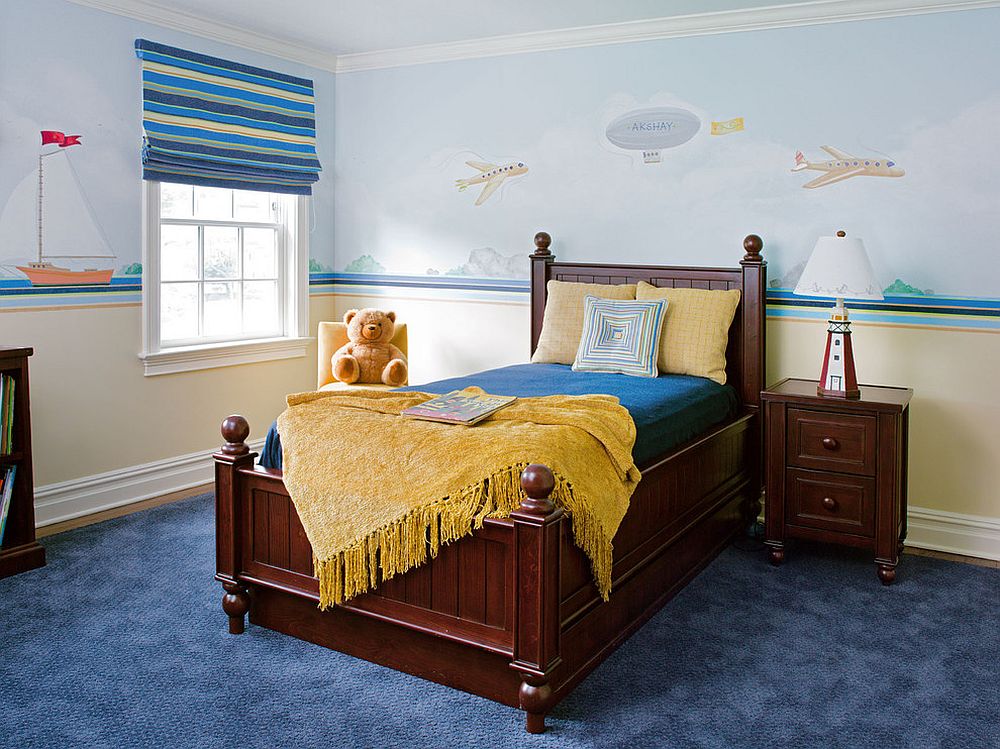 Yellow accents add brightness to kids' bedroom in blue [Design: Robin McGarry Interior Design]