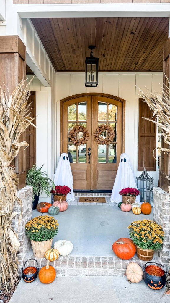 Farmhouse Porch with Ghosts and Haunted Harvest
