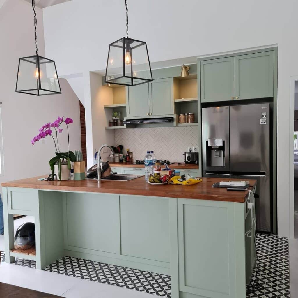 Light Sage Cabinets with Warm Wood Countertops
