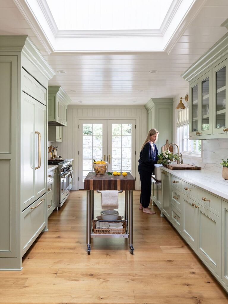 Soft Sage Kitchen with Gold Accents