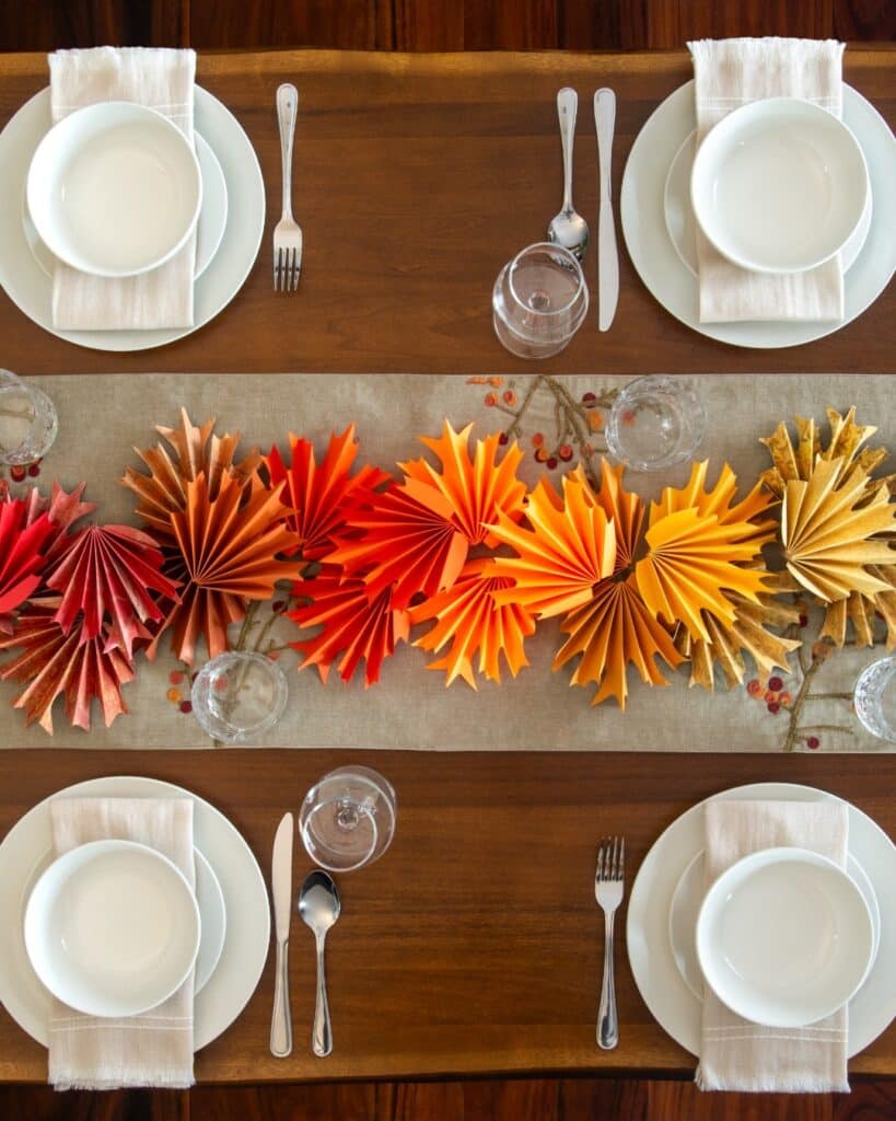 Leaf garland of folded paper on the table