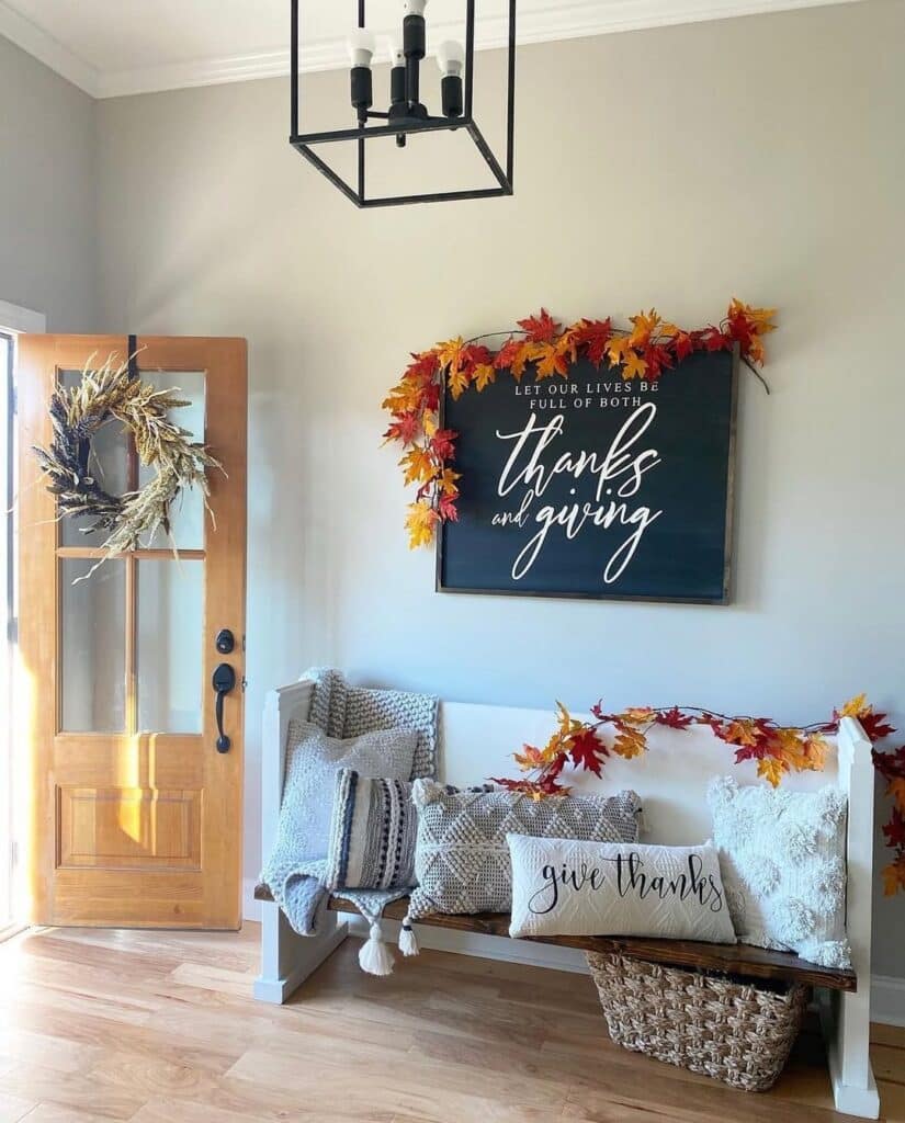 Leaf garland with a thankful theme for an entry bench