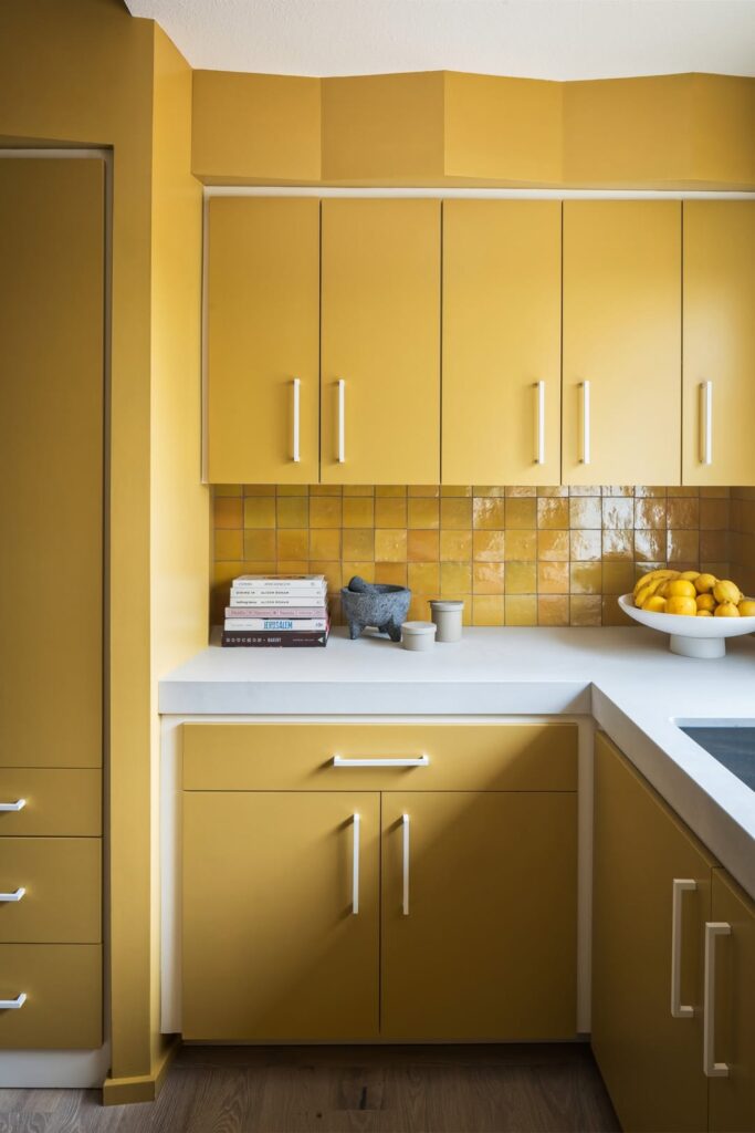 Moroccan Yellow Cabinets with Zellige Tile