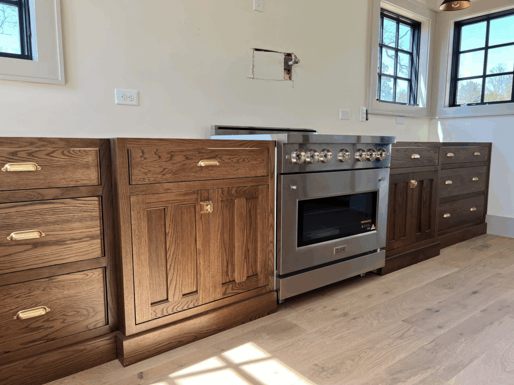 Brass Hardware on Walnut Cabinetry