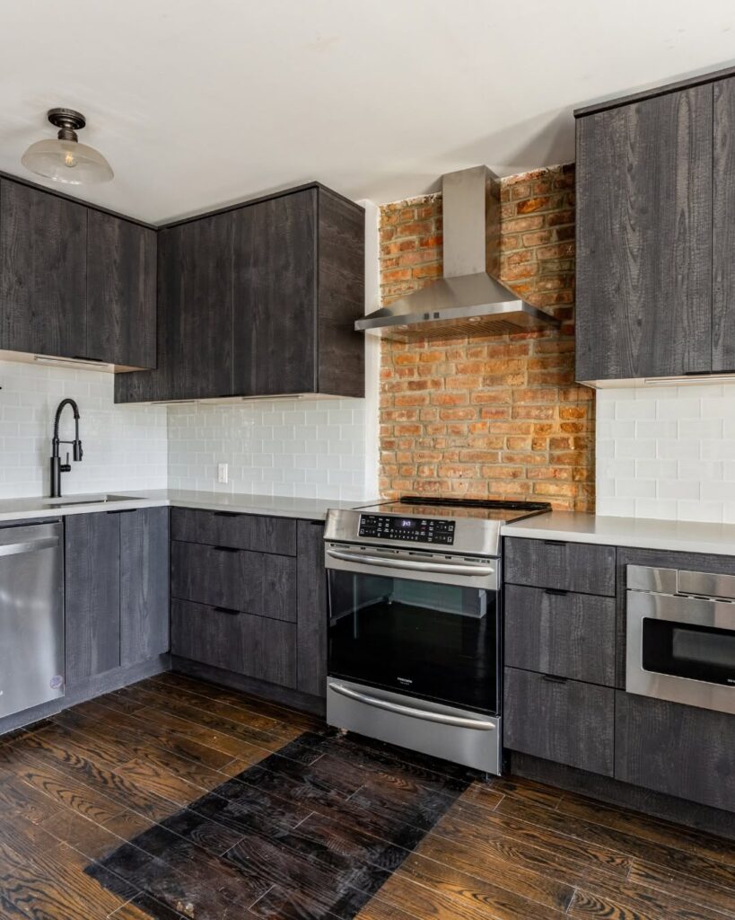 Industrial Charcoal Cabinetry and Steel Accents