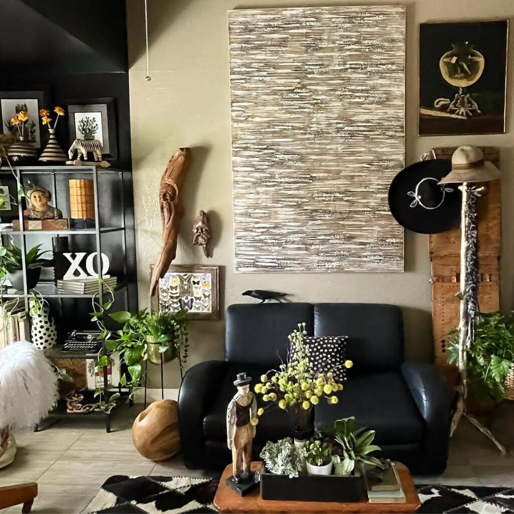 Sleek Black Sofa and Nature Accents