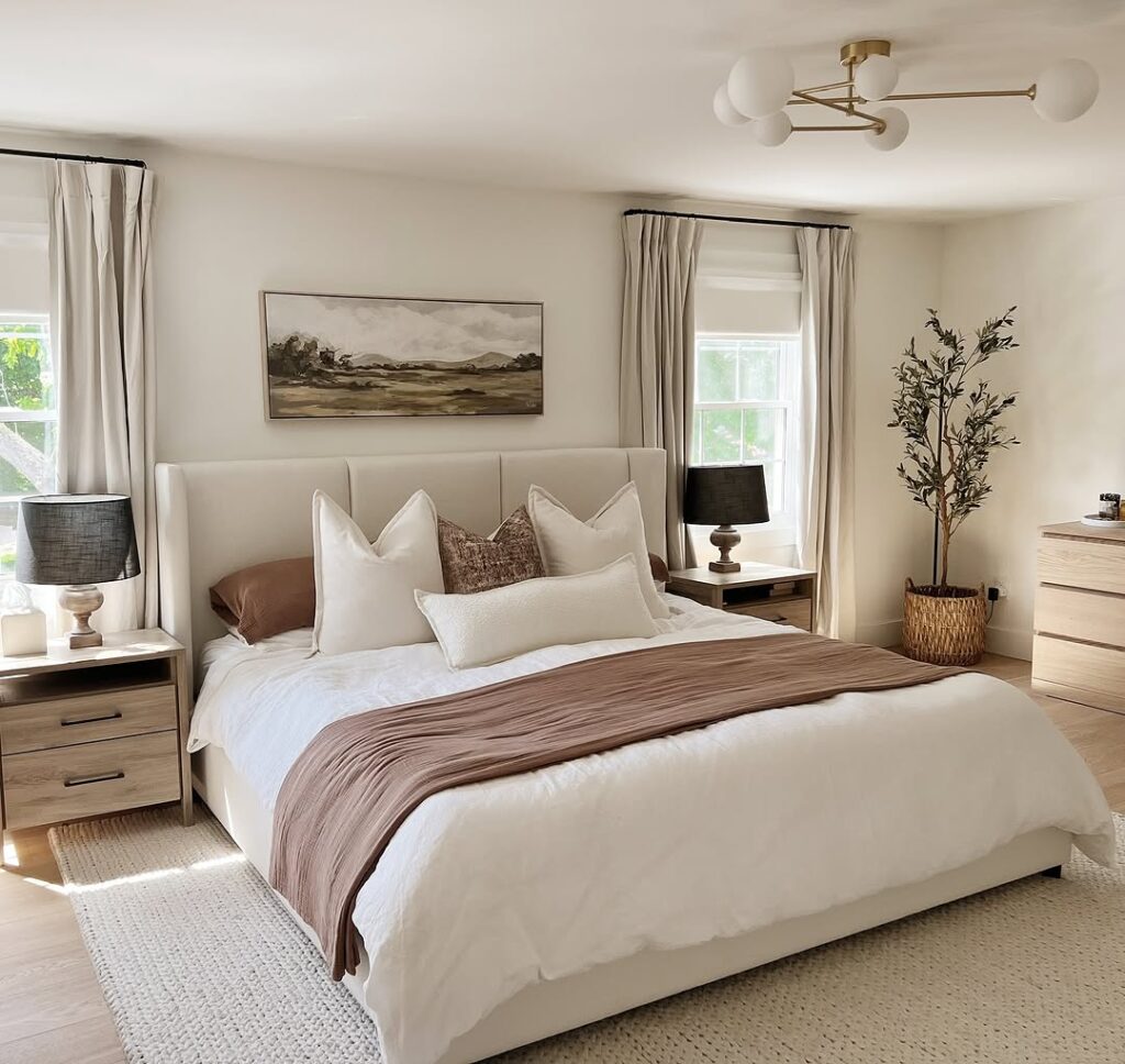 Earthy Throw and Muted Landscape Art