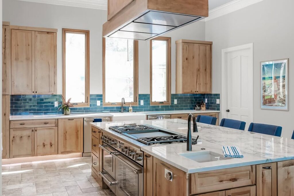 Natural Wood Cabinetry and Teal Backsplash