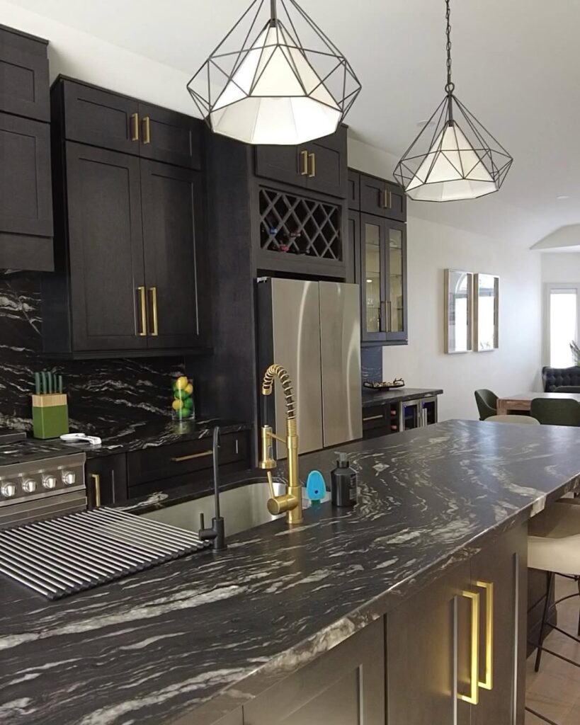 Matte Black Cabinetry Veined Stone Gold Hardware