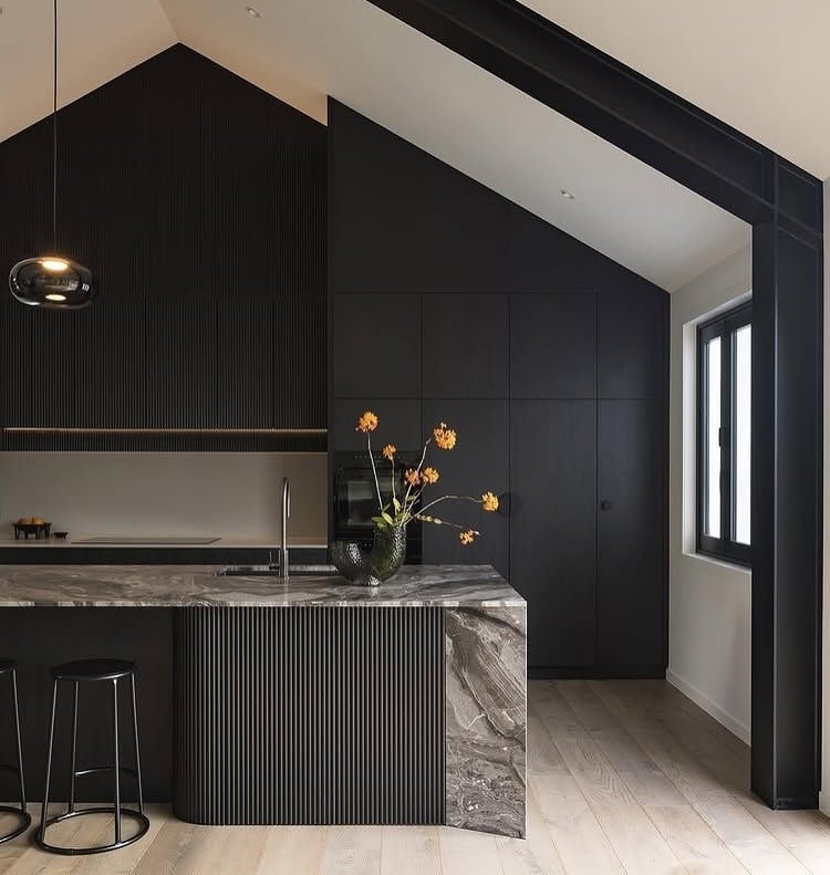 Stone Island with Black Matte Slatted Cabinetry
