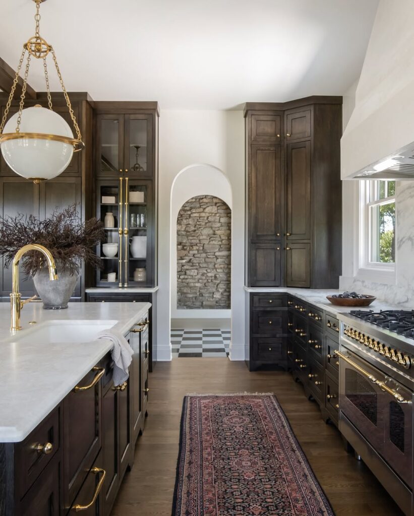 Dark Cabinetry and Brass Hardware