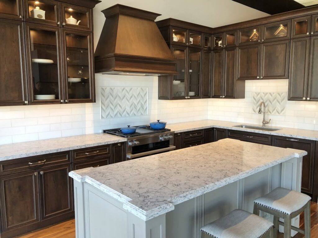 Dark Cabinetry and White Backsplash