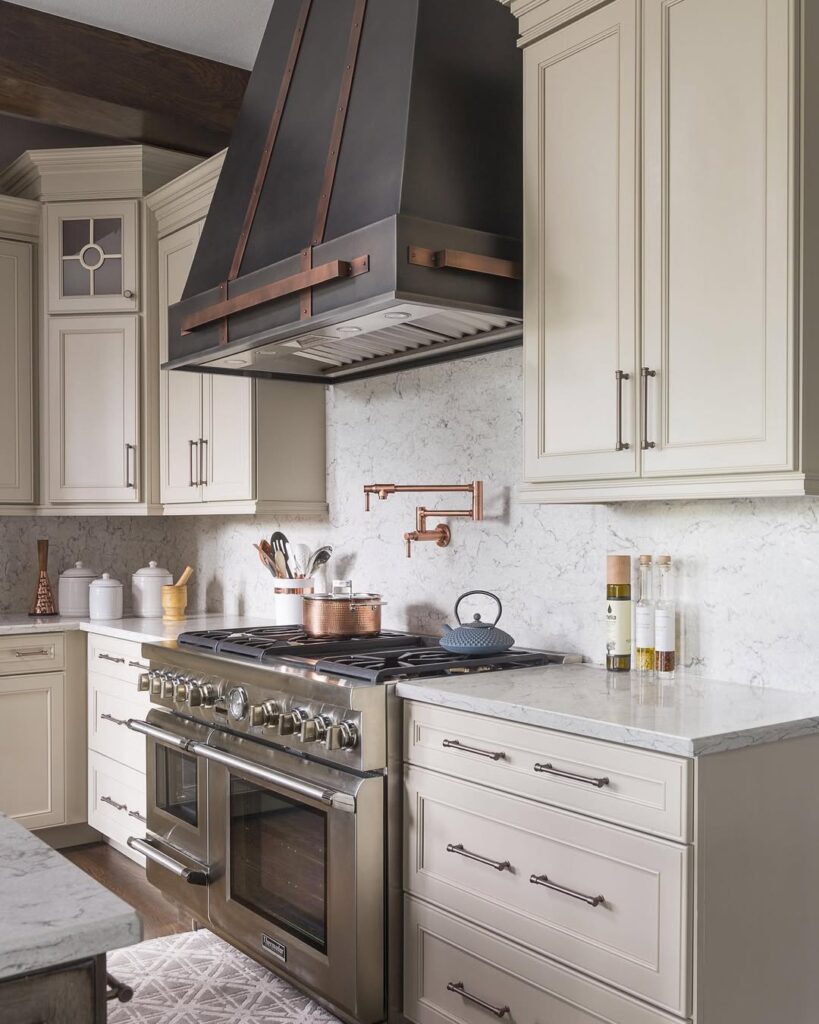 Taupe Cabinets and a Statement Hood