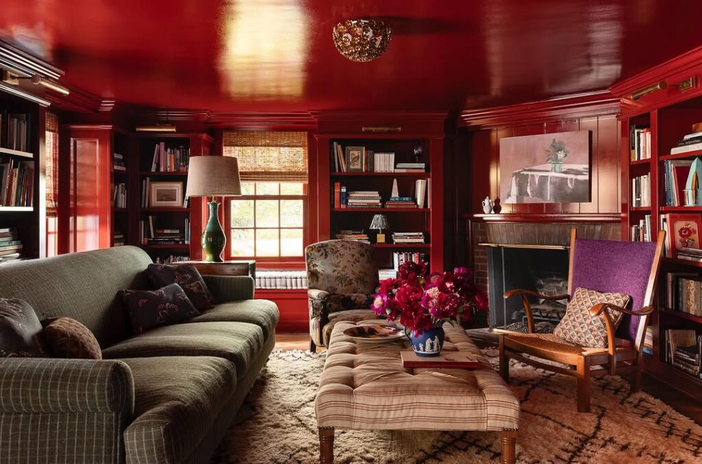 A Red Living Room with a High-Gloss Finish in the Library