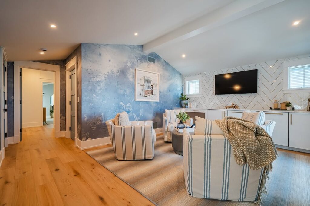 Accent Wallpaper with a Soft Coastal Watercolor Style for the Living Room